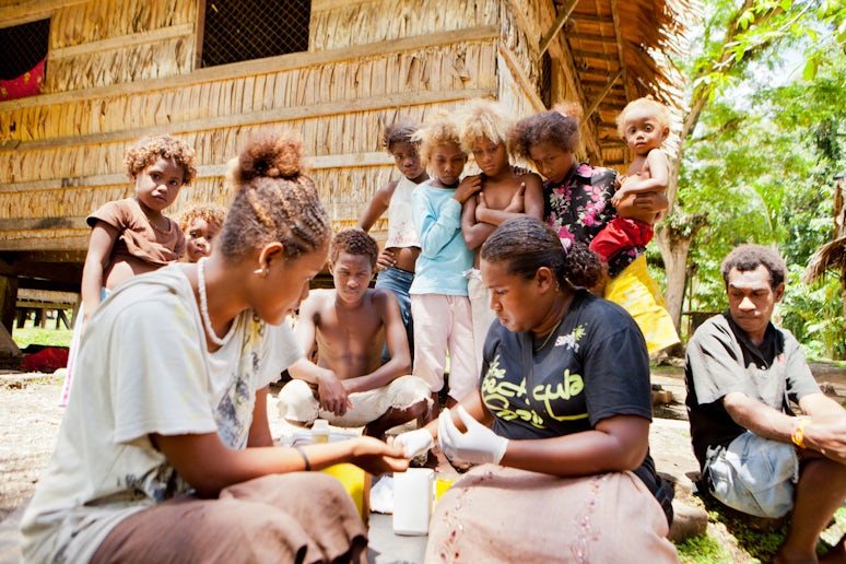In the village of Gegema, Solomon Islands, health worker takes blood samples for rapid diagnostic tests. © Global Fund / John Rae