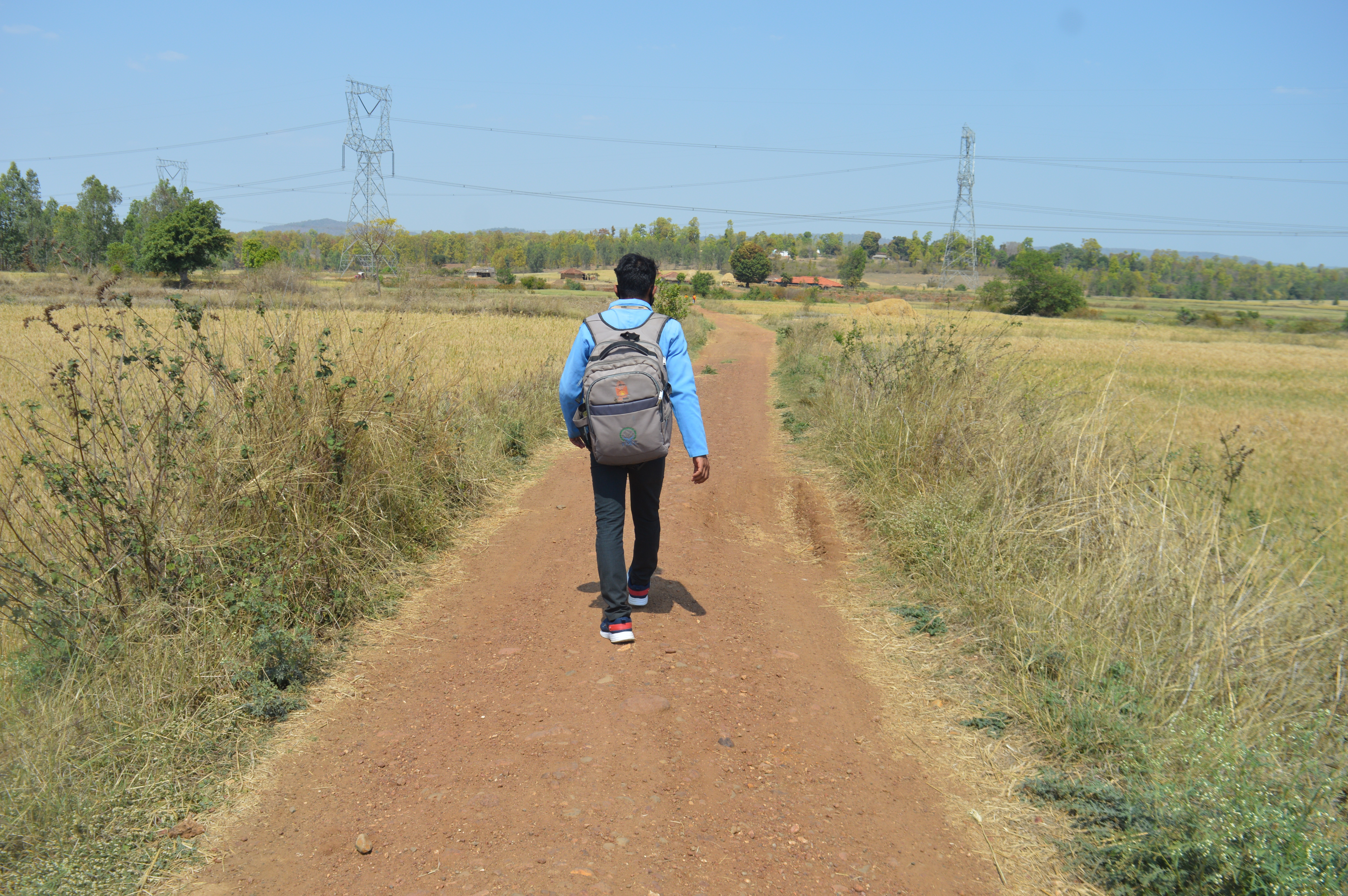 Field worker traveling between villages on foot in Mandla, India. Credit: MEDP Mandla 2021