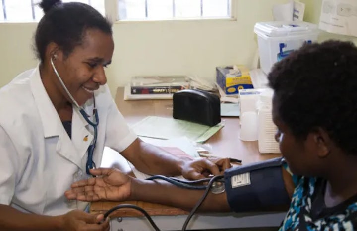 A patient getting a check up at the susa mama health clinic port moresby general hospital papua new guinea. photo by dfat