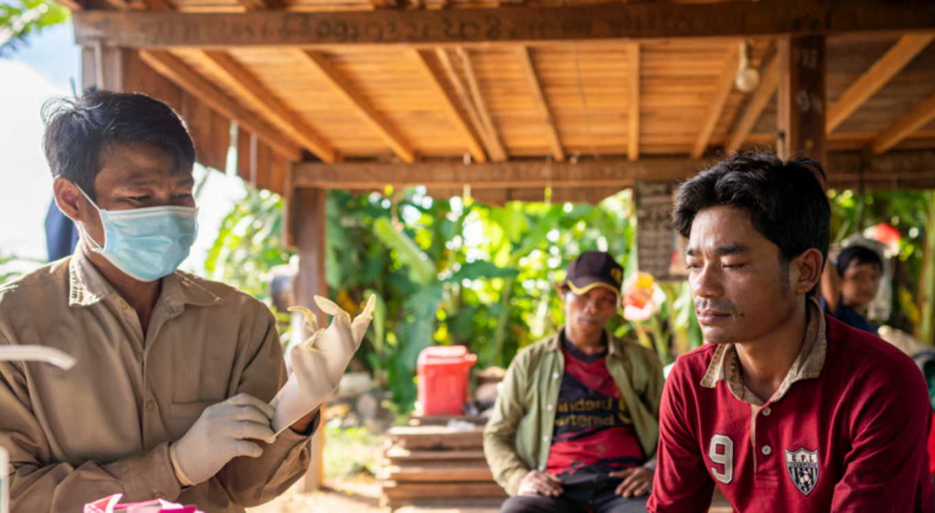 Who a raab village malaria worker paen narin left prepares to test an indigenous kreung man from his village in stung treng province cambodia